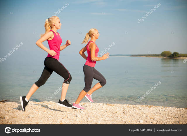 depositphotos_144610135-stock-photo-two-women-athlets-running-on